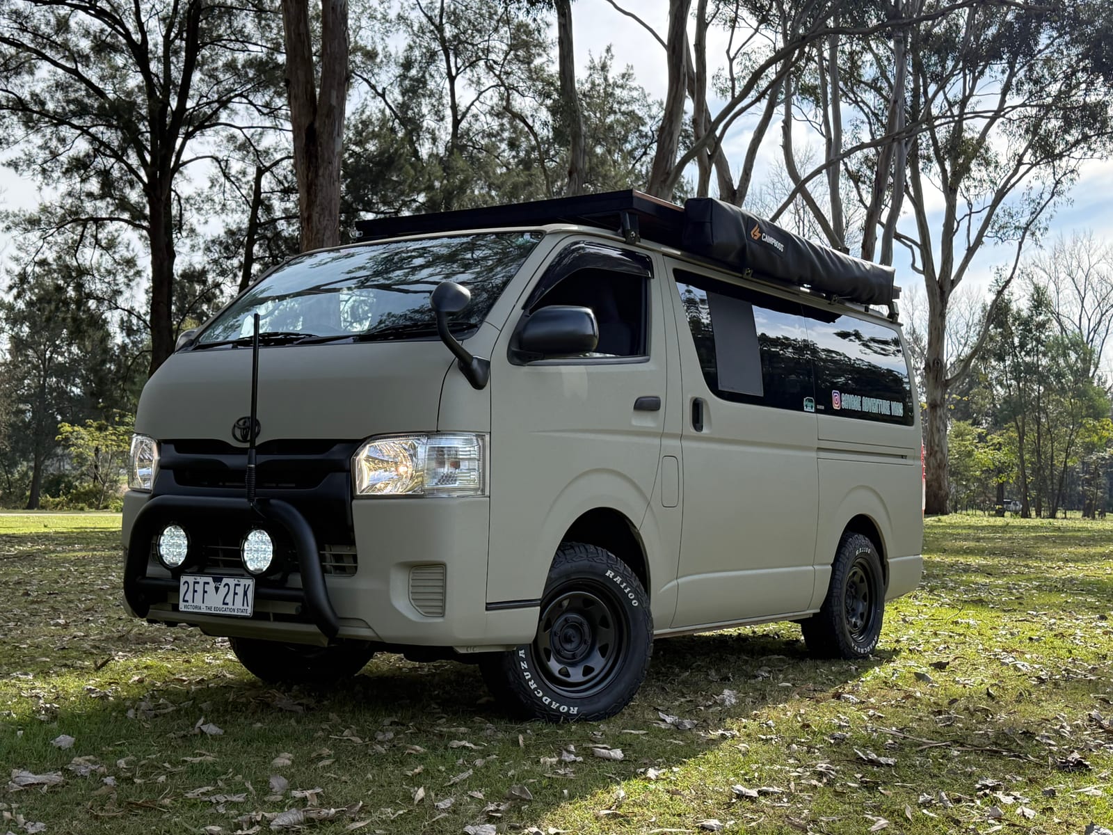 Khaki 4&times;4 Hiace &mdash; Rooftop tent folded down on the rack