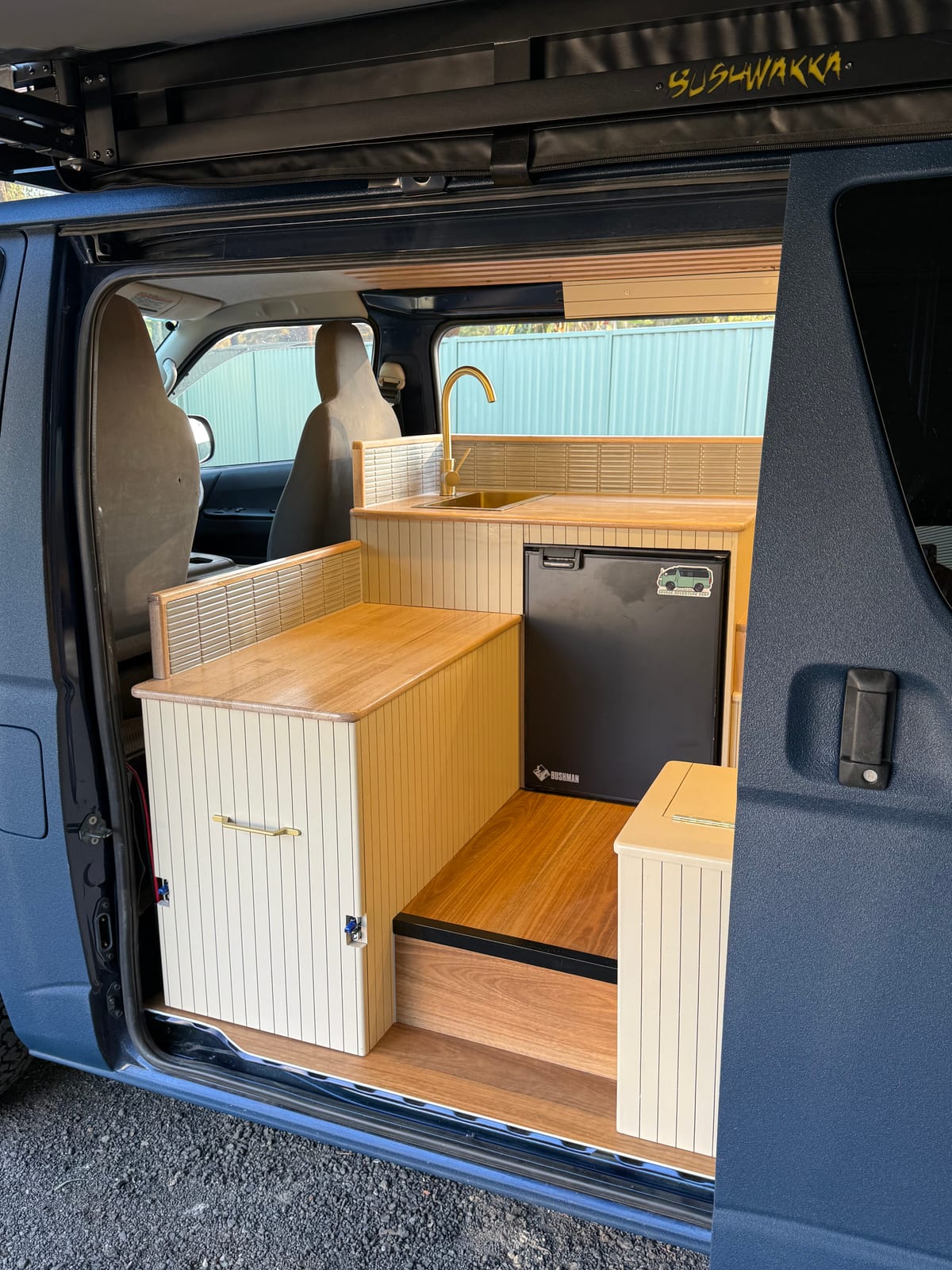Navy 4×4 Hiace — Galley through the side door