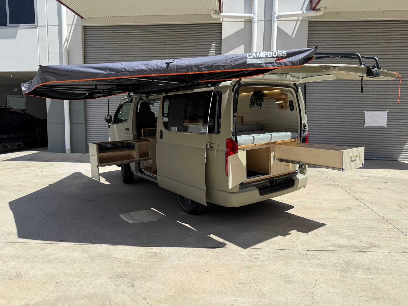 Sand Hiace &mdash; Side profile, awning extended
