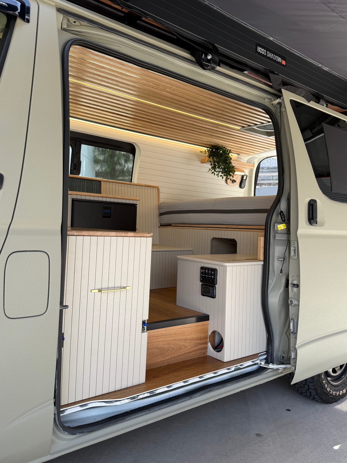 Sand Hiace — Cabinetry through the side door