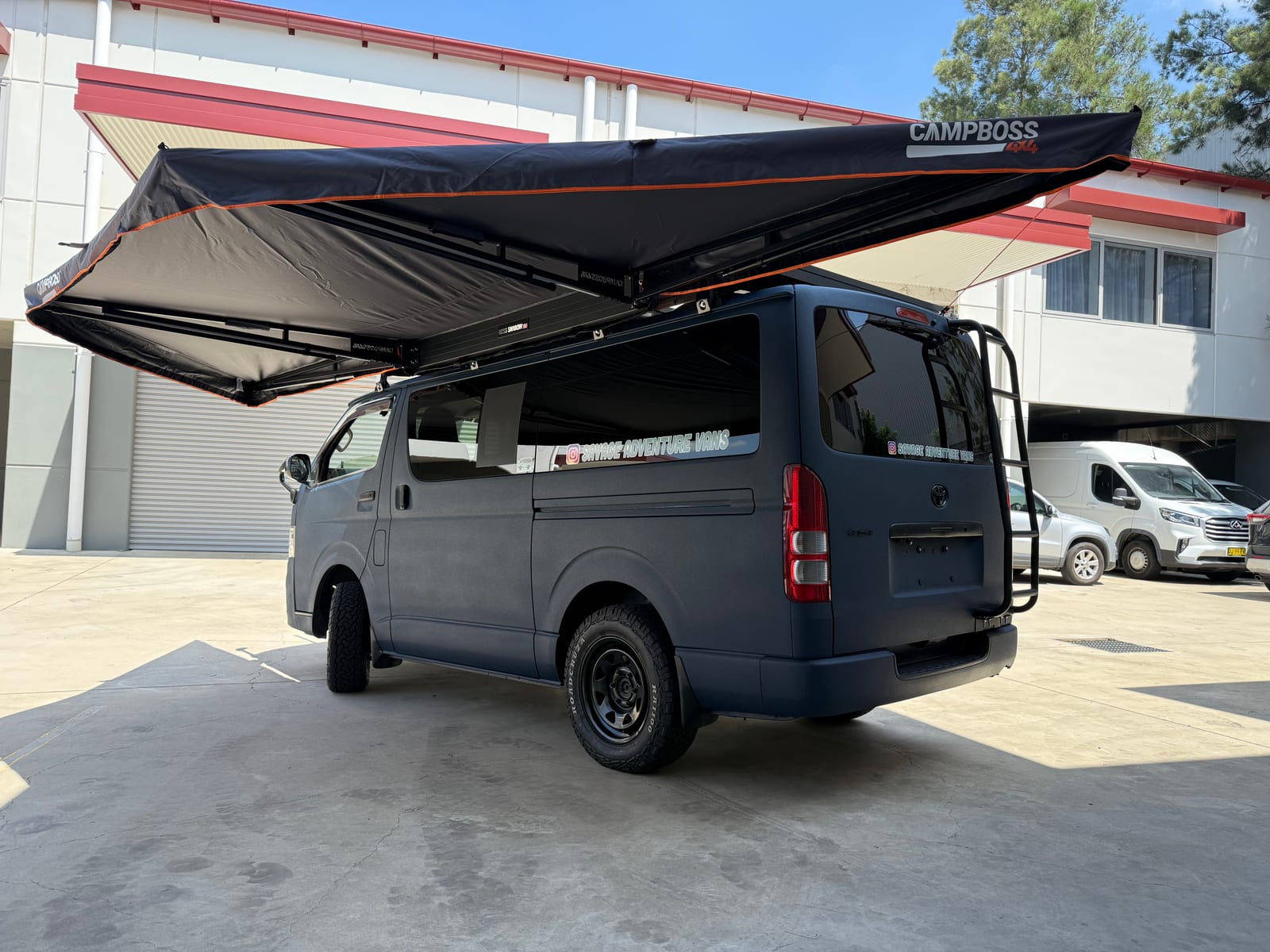 Slate Blue Hiace &mdash; Awning out at the workshop