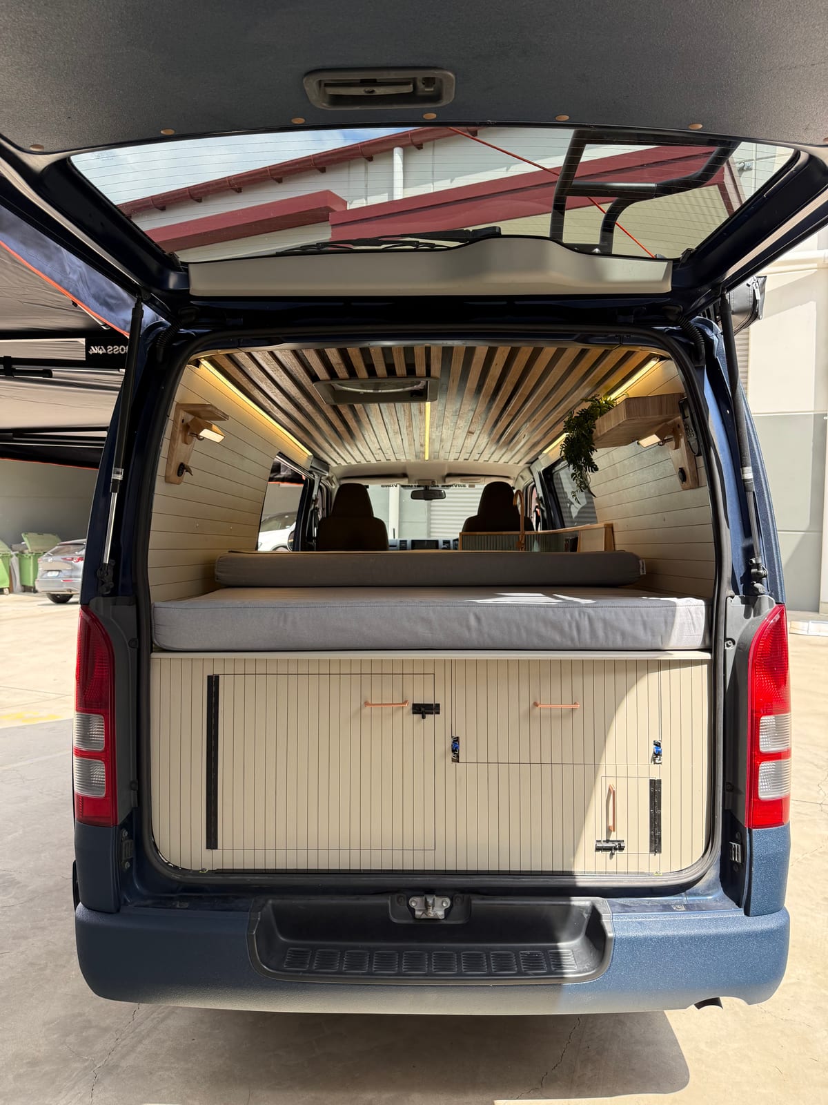 Slate Blue Hiace — Bed and rear storage