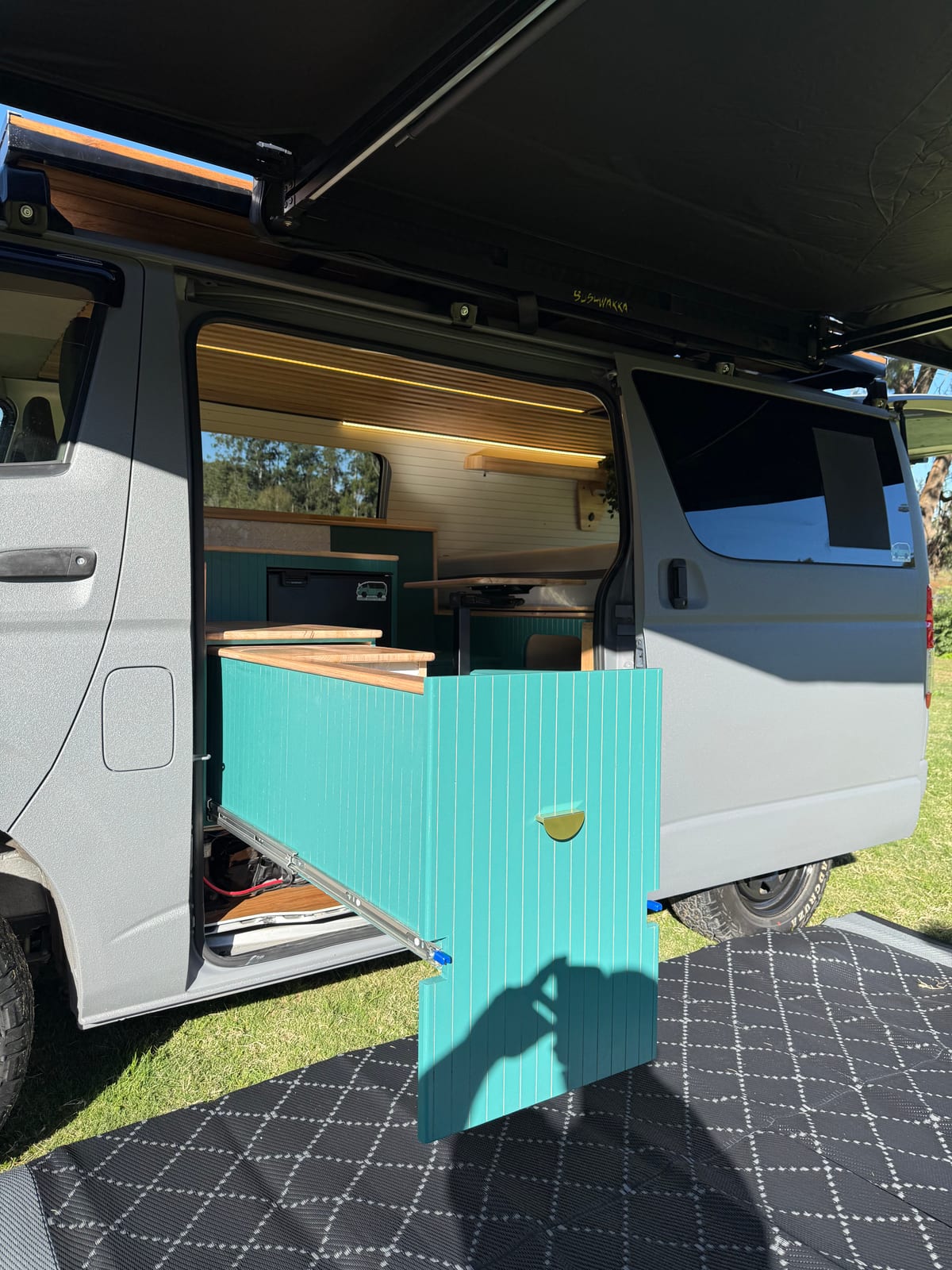Teal Galley Hiace &mdash; Cabinetry and bench detail