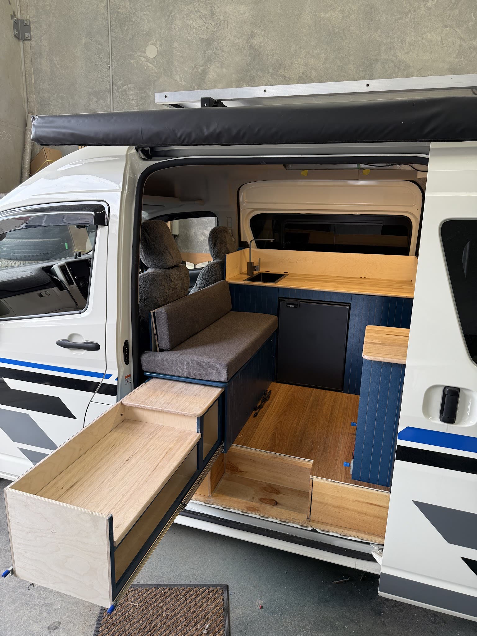 Storage running the length of the van